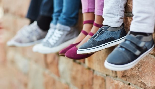 Little,Feet,Going,Big,Places.,Cropped,Shot,Of,Unrecognizable,Elementary