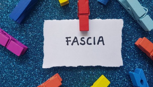 Fascia,Writting,On,Blue,Background.