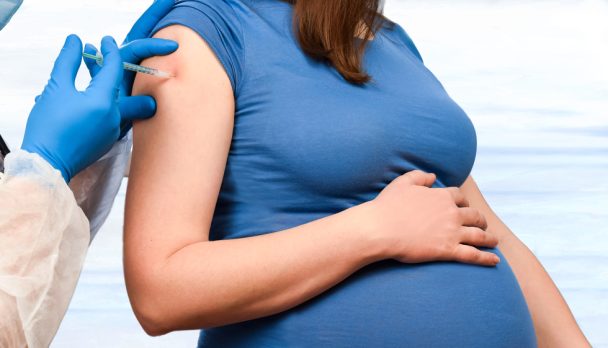 Pregnant,Vaccination.,Pregnant,Woman,In,Face,Mask,Getting,Vaccinated,In